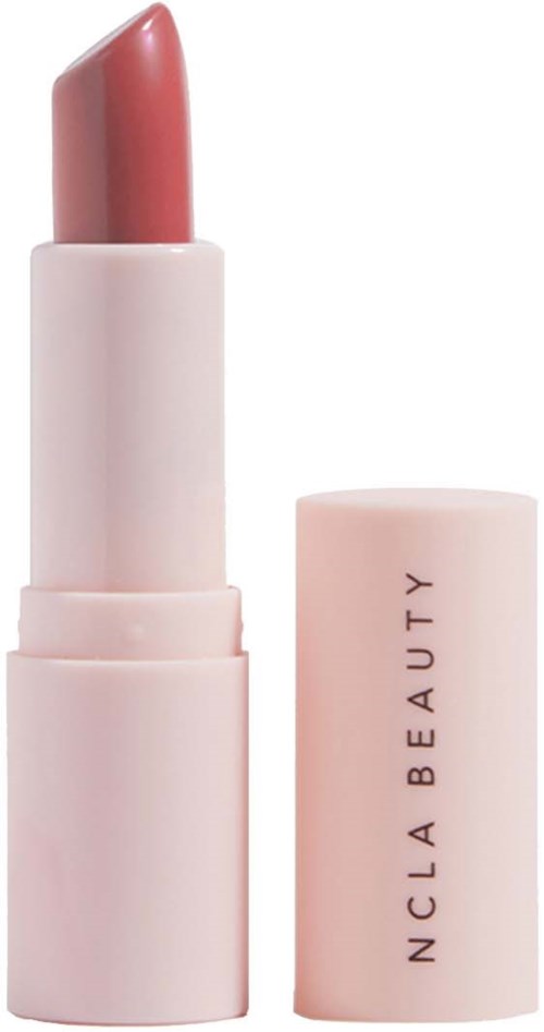 A pink lipstick with its cap off, showing the lipstick inside, and "NCLA BEAUTY" written on the cap.