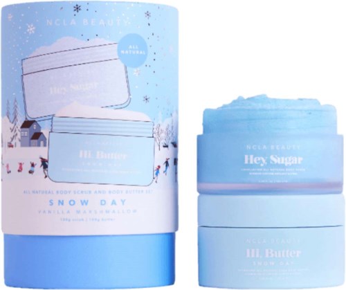A set of beauty products called Snow Day including body scrub and body butter with a winter theme.