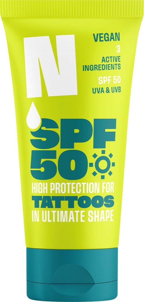 Vegan sunscreen lotion with SPF 50, active ingredients, UV protection, and tattoo care in a green and blue tube.