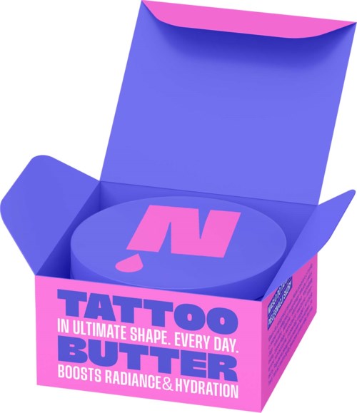 A pink and purple box with a round container inside labeled Tattoo Butter, promoting skincare for radiance and hydration.