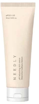 A plain beige tube with a white cap, labeled 'NEEDLY,' for skincare or facial cream.