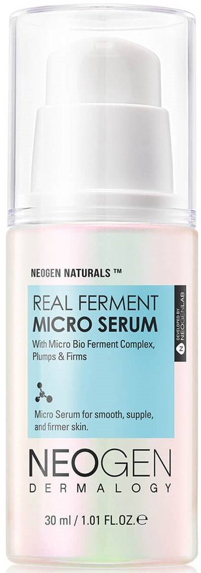 A small pink bottle of Neogen Real Ferment Micro Serum with a clear cap and label describing its benefits.