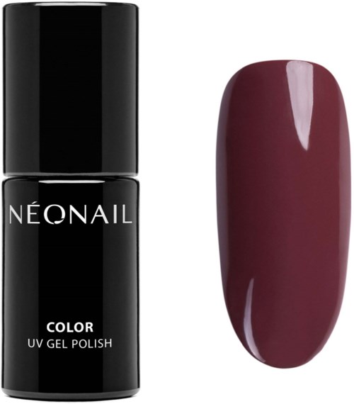 Neonail UV-kiiltohu spoilto ja sivellin kynnenä tummanpunaisella värillä.