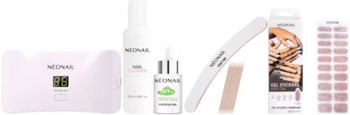 Ein professionelles Nagelpflegeset mit LED-Lampe, Reiniger, Öl, Nagelstreifen und Gelaufkleber für Nägel.
