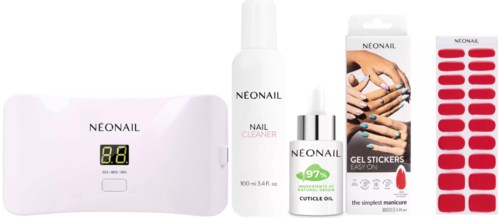 Nagelpflegeprodukte mit LED-Lampe, Nagelreiniger, Cuticle Oil, Gel-Sticker und Handbild.