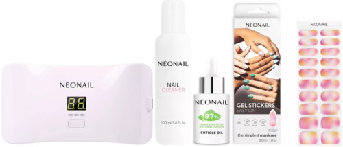 Zestaw do manicure zawiera lampę LED, czyścik do paznokci, olejek do skórek, naklejki żelowe i lakier do paznokci.