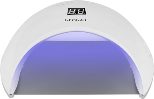 En vit UV-nagellampa med digital timer upptill, som lyser blått inuti, och märket 'Neonail'.