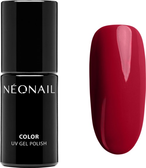 Czarna butelka lakieru do paznokci 'Neonail Color UV Gel Polish' i czerwony pomalowany paznokieć.