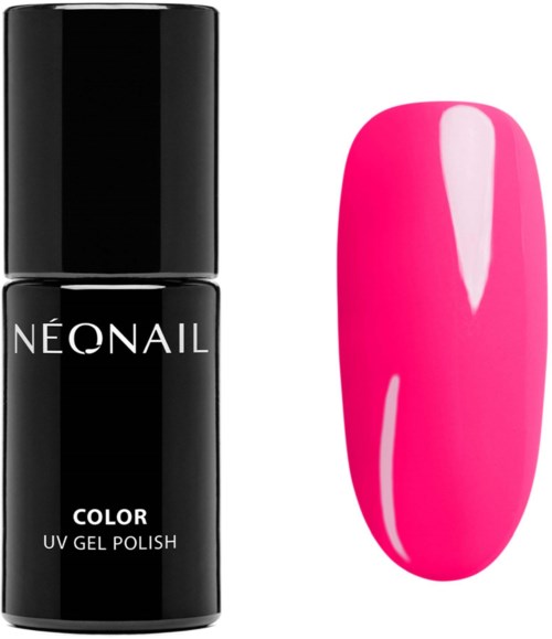 Black nail polish bottle next to a bright pink painted nail.