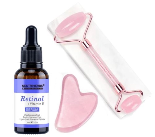 IHonshuoltuotteet kuten retinol-serumi, jade-rulla ja gua sha -työkalu kasvoille.