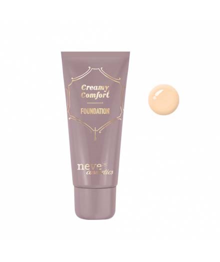 En lila tub med foundation med guld- och vit text, och en liten mängd foundation bredvid.