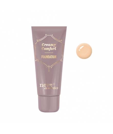 En lila tub märkt 'Creamy Confort Foundation' med en liten klick beige foundation bredvid.