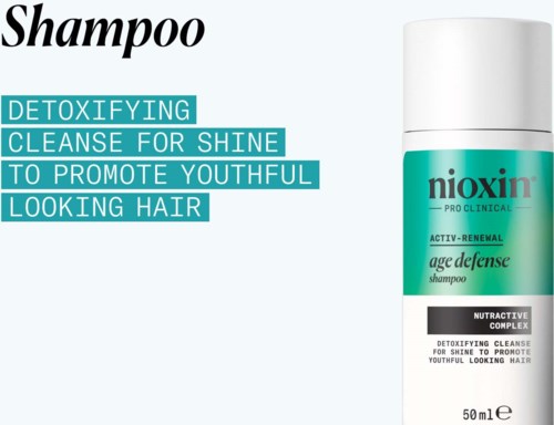 En hvid shampoo-flaske mærket 'nioxin' med blå og sort tekst, fremmer afgiftning og ungdommeligt udseende hår.
