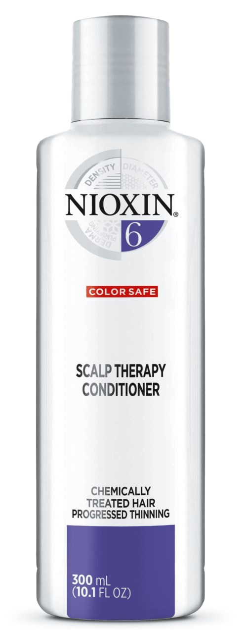 En vit flaska märkt Nioxin, 6, scalp therapy conditioner, 300 ml, för färgat, behandlat och tunnare hår.