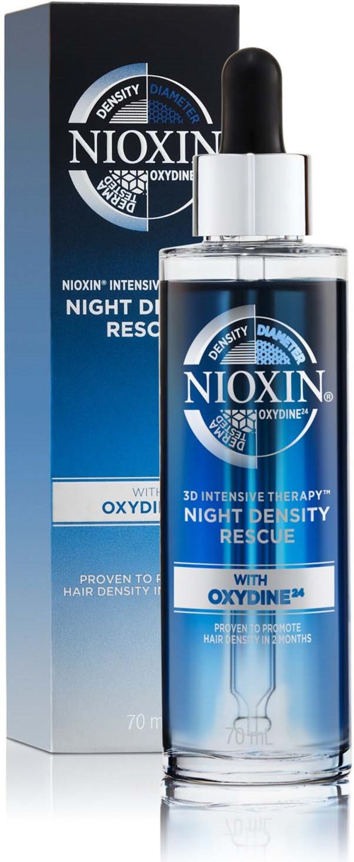 A bottle of hair serum and its box, both labeled Nioxin Night Density Rescue with OxyDine, in black and blue colors.
