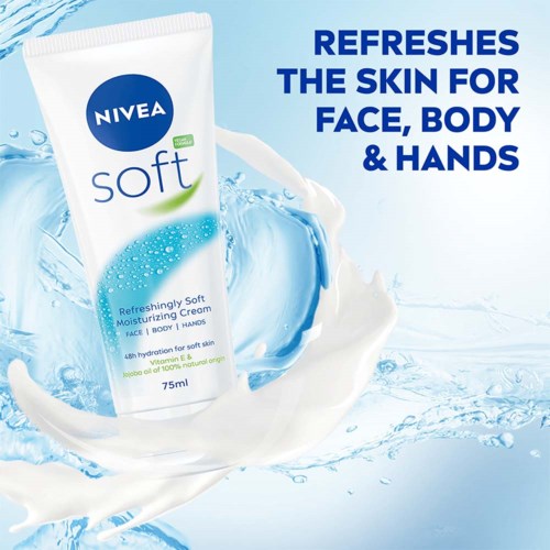 A white Nivea Soft cream container floats in clear, blue water with ripples.
