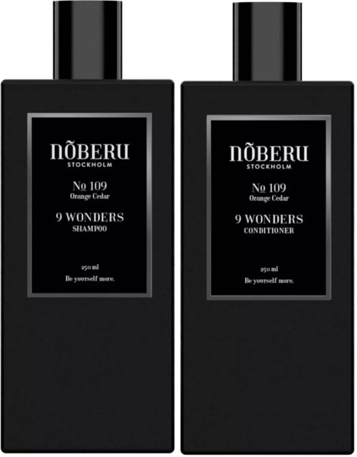 To sorte flasker, en til shampoo og en til conditioner, mærket No 109 Orange Cedar fra Noberu Stockholm.
