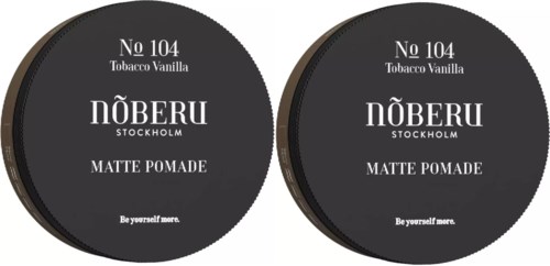 To runde dåser med Nöberu tobak vanilje matte pomade med sorte etiketter og hvid tekst.