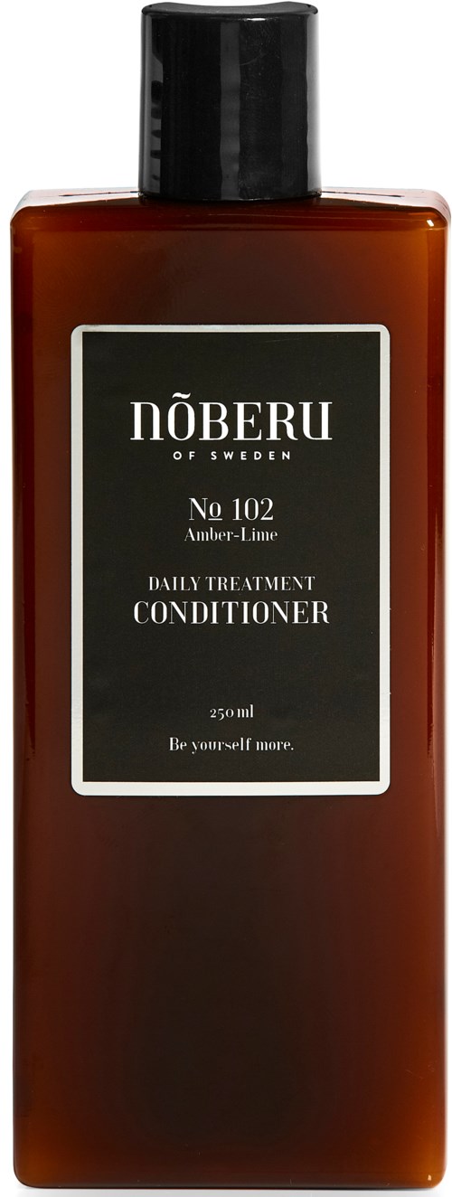 En brunt flaska med svart lock märkt 'NÖBERU, daglig vårdarebalsam, 250ml, var dig själv mer.'