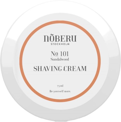 A round label for Nöberu shaving cream with brand name, scent No 101 Sandalwood, 75ml, and uplifting slogan.