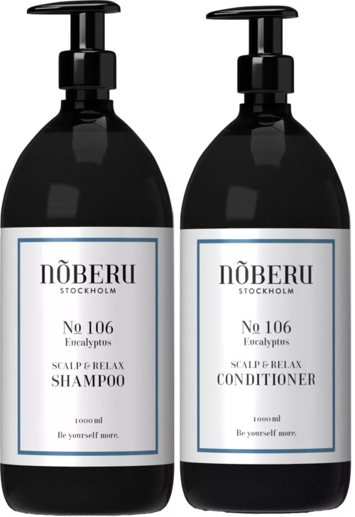 To svarte flasker merket for sjampo og balsam, begge har pumpe og hvite etiketter med tekst.