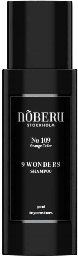 En sort shampoo flaske med hvid tekst, mærket No 109 Orange Cedar fra NÖBERU Stockholm.