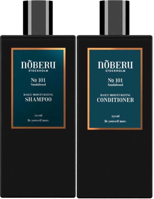 Two black bottles with blue and orange labels, one for shampoo and one for conditioner, from Növeru Stockholm.