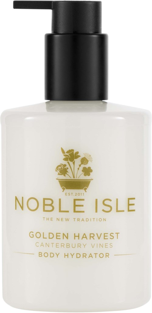 En hvid bodylotionflaske med sort pumpekopp, gul tekst og en plante i en potte logo.