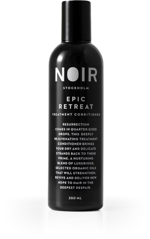 En svart flaska från Noir Stockholm Epic Retreat behandlingbalsam med vit text.