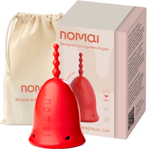 A red menstrual cup with a textured stem, a beige pouch, and packaging describing it as designed by a gynecologist.