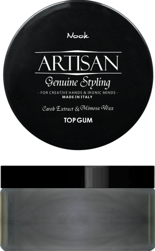 Ett svart runt behållare med vit text som nämner 'Artisan', 'Genuine Styling' och smak 'Top Gum'.