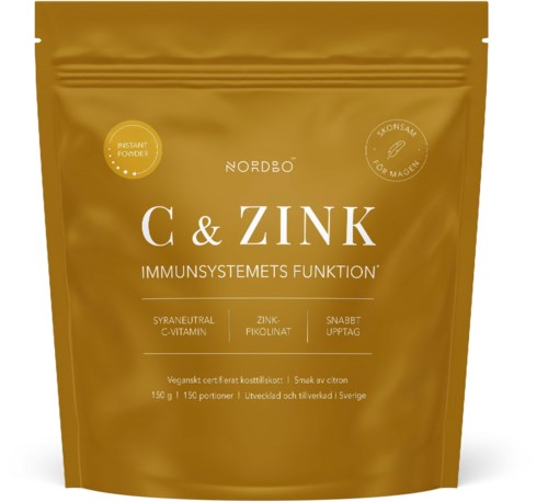 Ett guldfärgat återförslutbart paket för C- och zinktillskott, med text om ingredienser och hälsofördelar.