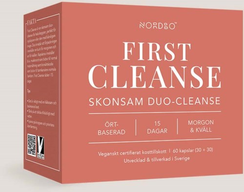En rosa boks merket 'First Cleanse' med informasjon om et detoxprodukt, inkludert 'Duo-Cleanse', 15 dager og veganske kapsler.