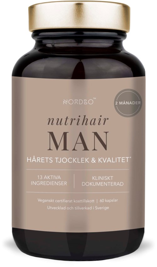 En mørk flaske med beige etikette og guldhætte, mærket 'NUDE HAIR MAN,' som indikerer hårvitaminer til mænd.