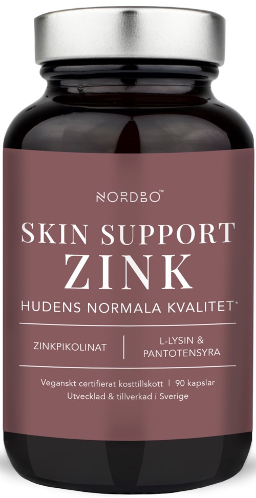 Tumma pullo, jossa vaaleanpunainen etiketti, edistää sinkkituotteita ihon hyvinvoinnille.