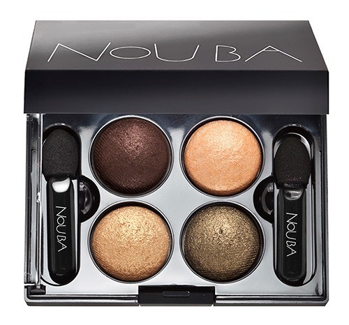 A compact eyeshadow palette with four shimmery colors and two small applicators. The palette is labeled 'NOU BA' and has a black lid.