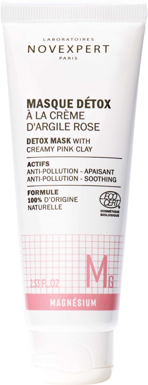 En hvid tube med detoxmaske med rosa ler, mærket på fransk og engelsk, der fremmer anti-forurening og beroligende effekter.