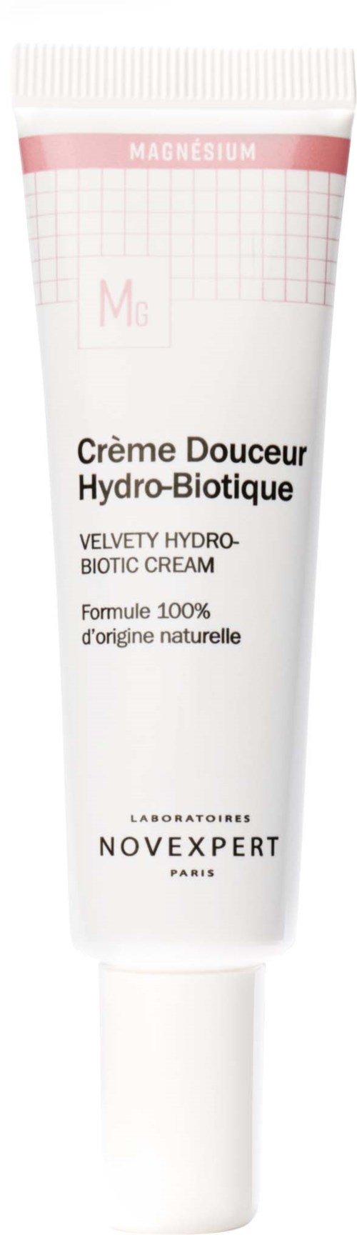 En hvid tube med pink og sort tekst, der angiver fugtighedscreme med naturlige ingredienser og magnesium.