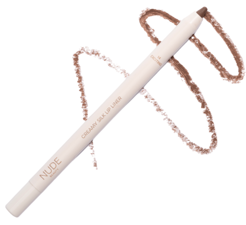 En hvit sminke penne med rosa kurver rundt den, ligger flatt. Den har teksten 'NUDE' og 'CREAMY SILK UP LINER'.