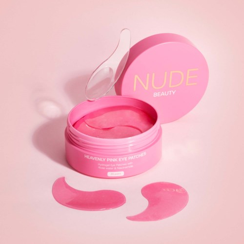 Ruusun sävyiset silmänympäryspalatet rasia, jossa kaksi irtogril. Rasia lukee 'NUDE BEAUTY' ja 'Heavenly Pink Eye Patches.'