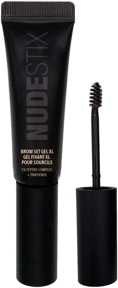 Ein schwarzer Tube mit Augenbrauengel und einer Bürste daneben, beschriftet NUDestix, für Augenbrauenstyling.