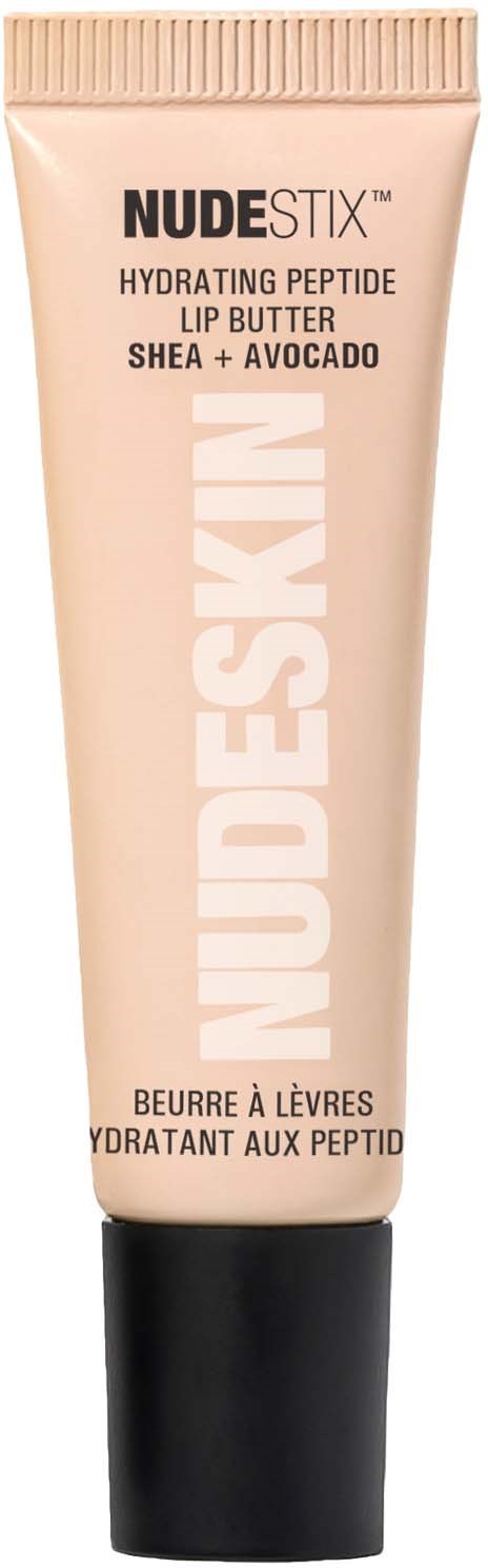 En ljusrosa tub med Nudeskin läppbalsam med svart lock, märkt med produktinformation och ingredienser.