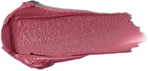 Ein dicker, rosa Lippenstiftstrich auf weißem Hintergrund, zeigt glänzende Textur.