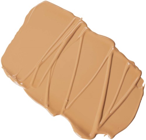 En karamellöverdragen snacks med zigzag-chokladsås ovanpå.