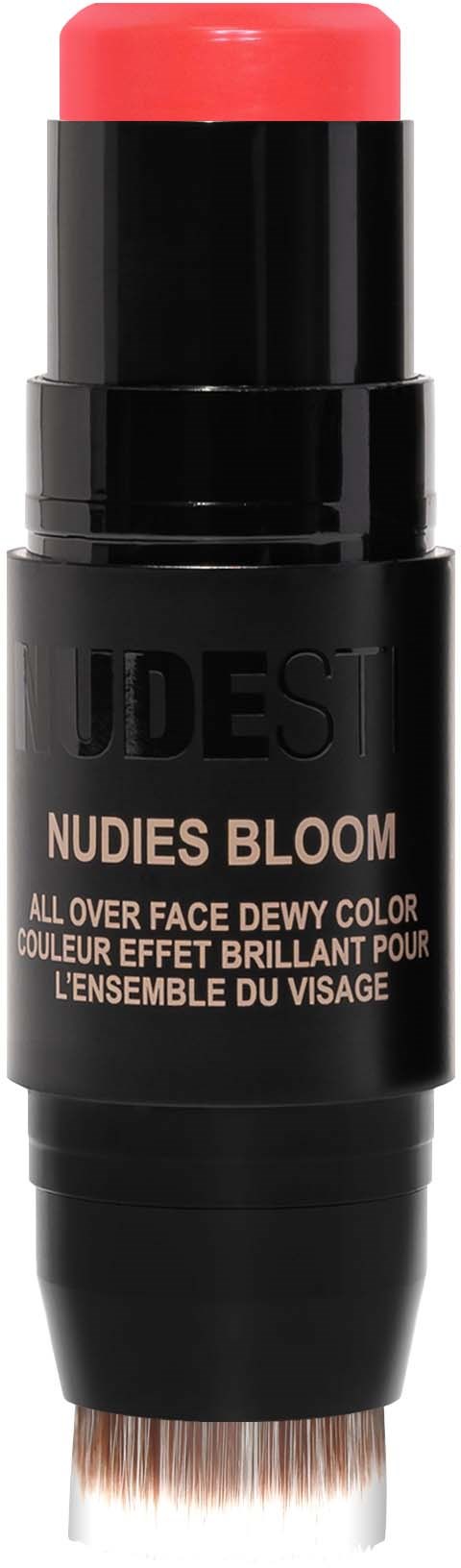 Tämä on meikkituote nimeltä NUDEST Nude Bloom, jossa on vaaleanpunaista väriä ja sivellin pohjassa.