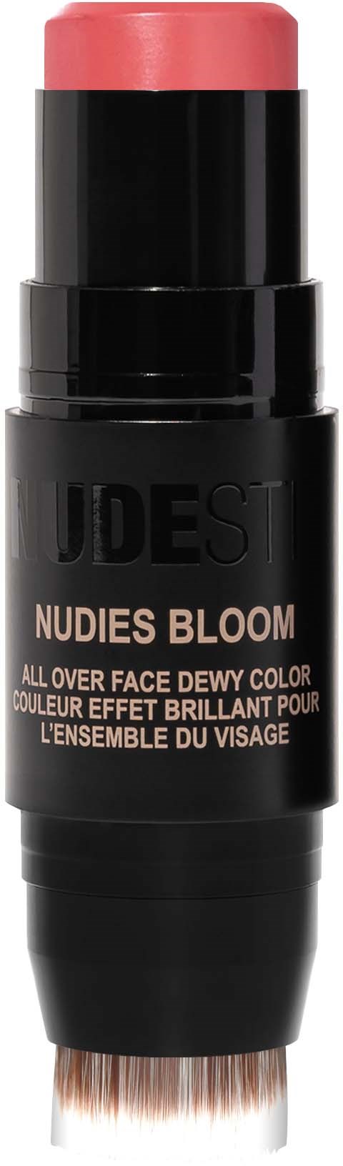 Musta kosmetiikkatuote, jossa on vaaleanpunainen kärki, merkitty "NUDES BLOOM" kasvomakepudistukseen. Näyttää kynältä tai tusilta.