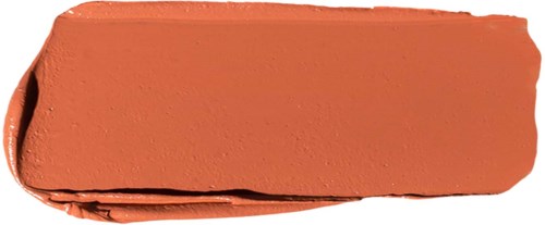 Ein Streifen in Orange oder Terrakotta-Farbe, Make-up oder Lippenstift auf einer Oberfläche.