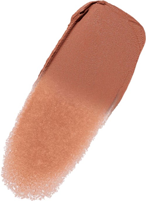 Ein beiger Schminkstift mit abgerundeter, flacher Spitze, teilweise benutzt und mit verstreutem Puder.
