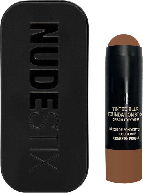 Ein schwarzer NudesX-Palettenkasten neben einem braunen getönten Foundationstift.