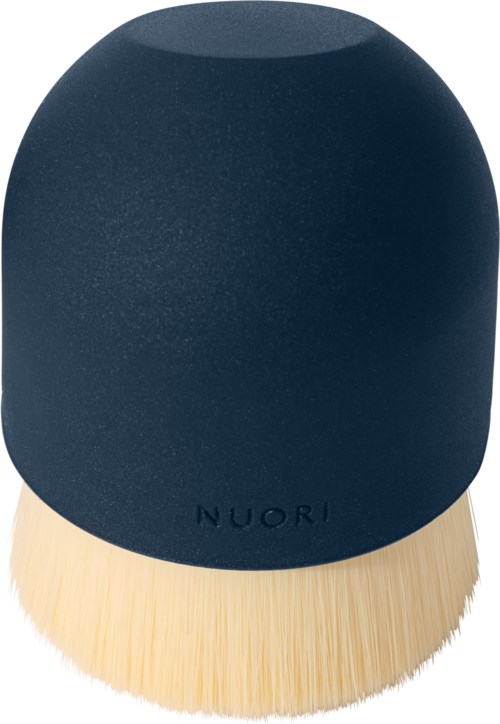 A black cleaning device with a beige brush base, labeled "NUORI". It has a rounded shape and appears to be a brush or scrubber.